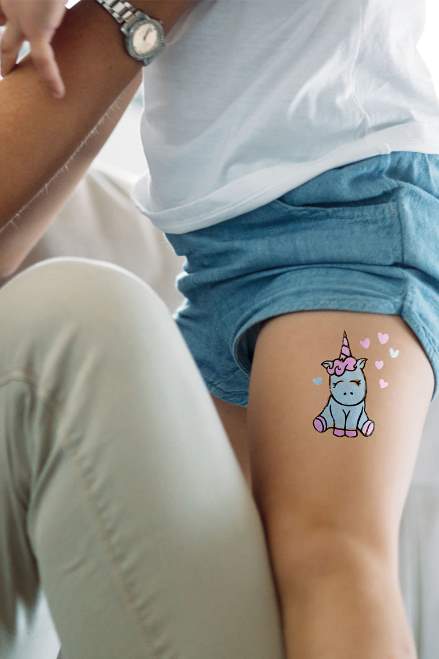 little girl with a nice temporary tattoo